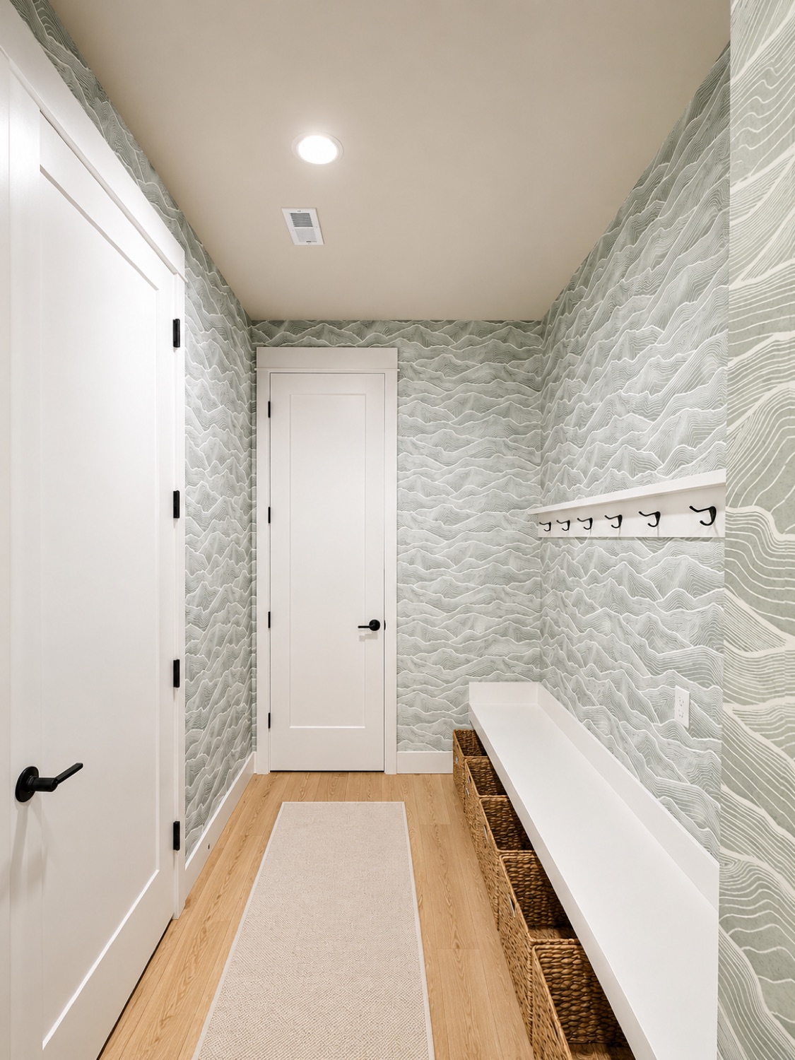 Hands preparing and smoothing a wall surface